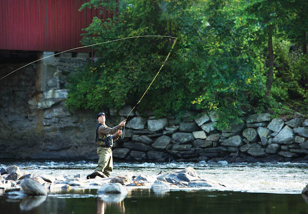 Man fishing in a river