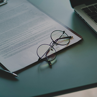 Glasses on Paperwork