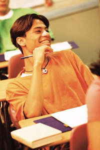 boy laughing in class