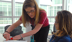 Teacher working with a student