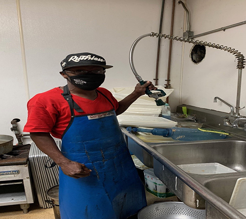 Man washing dishes