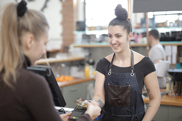 cashier ringing up a customer