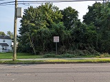 Photo of land with sign-small