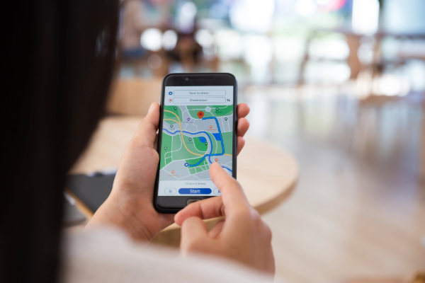 Person on phone with GPS