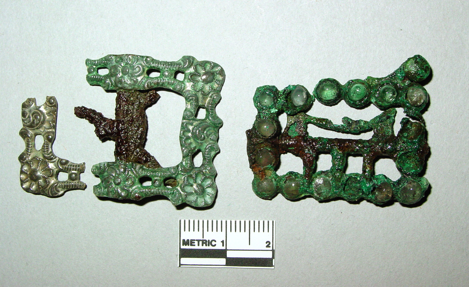 Two knee buckles