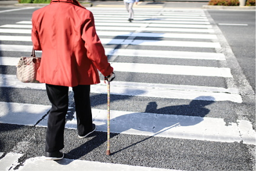 elderly pedestrian in a zebra crossing - by numbers - mature pedestrian safety