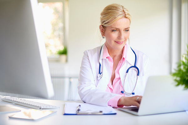 doctor on computer