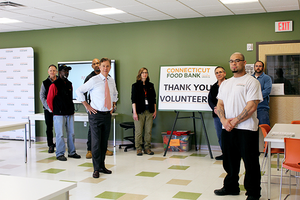 Governor Lamont with Volunteers from the Connecticut Food Bank.