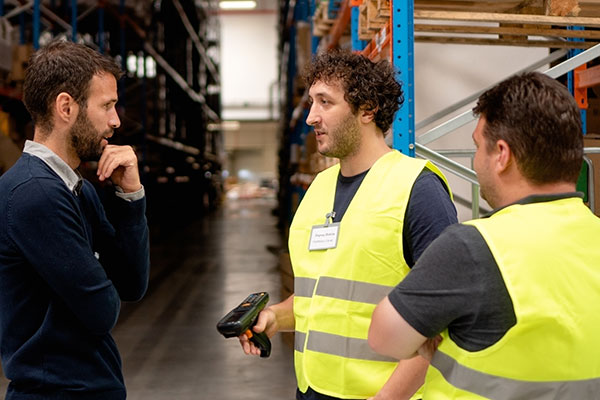 warehouse workers and manager
