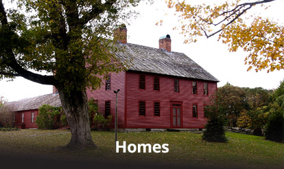 red farm house in a country setting