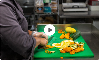 Chef chopping vegetables