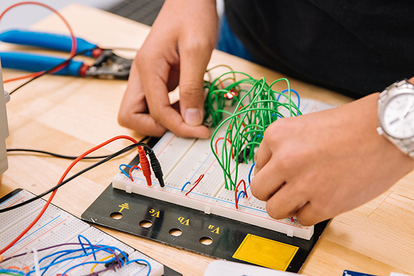 Vocational education student learning about electrical circuits